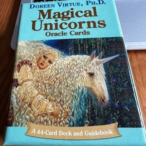 Rare oracle deck of cards and book, no longer in print. Never used, like new.